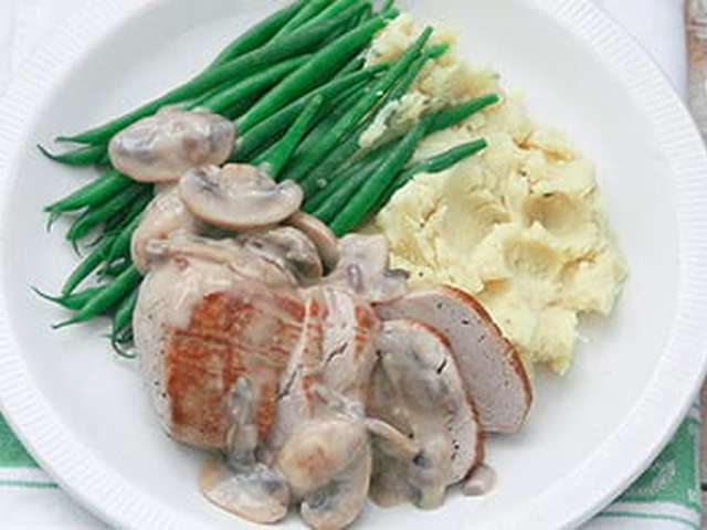Foto Varkenshaasje met champignonsaus en sperzieboontjes
