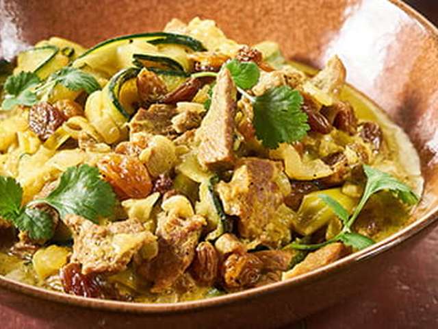 Foto Kalkoencurry met groente en zilvervliesrijst