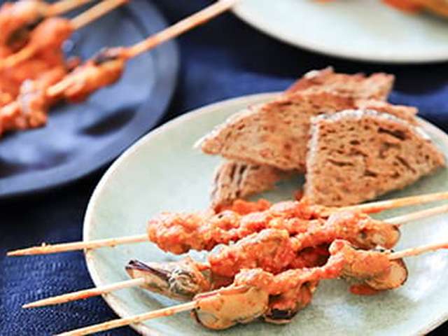 Foto Mosselspiesjes met Romescosaus