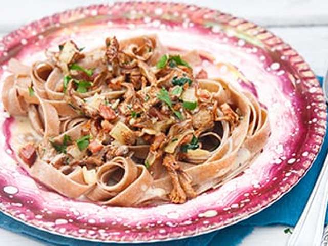 Foto Tagliatelle met cantharellen