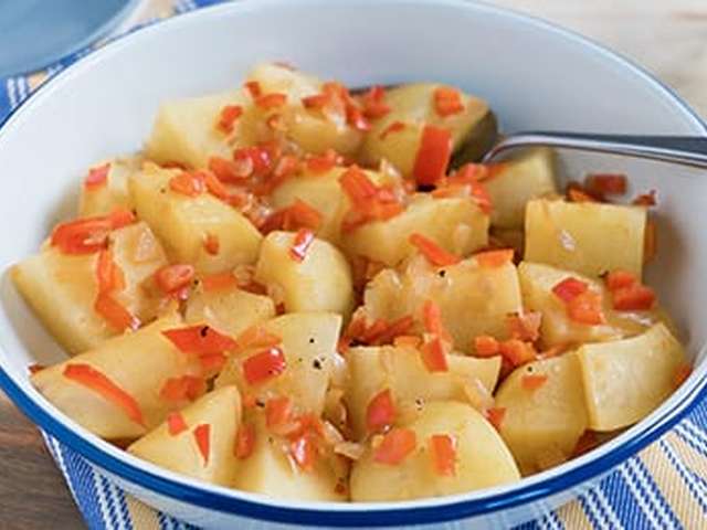 Foto Aardappelen in paprikajus
