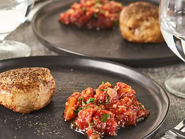 Foto Varkensoester met tomatensaus